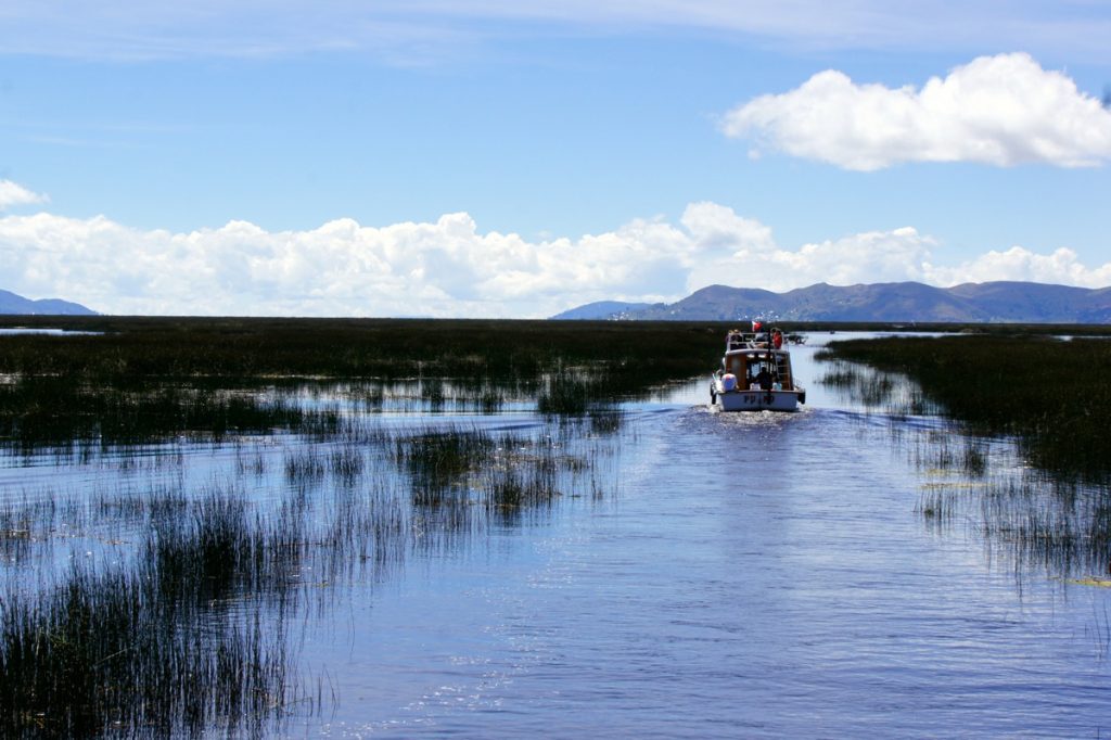 A speedboat gliding across Lake Titicaca 