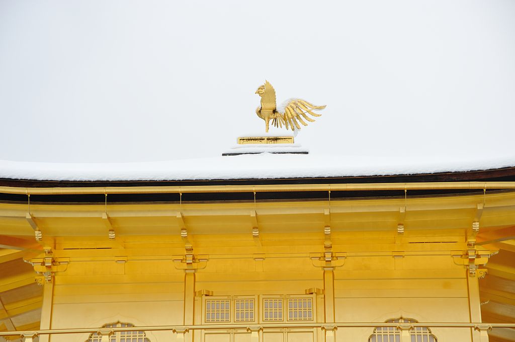 golden phoenix on top of kinkakuji temple