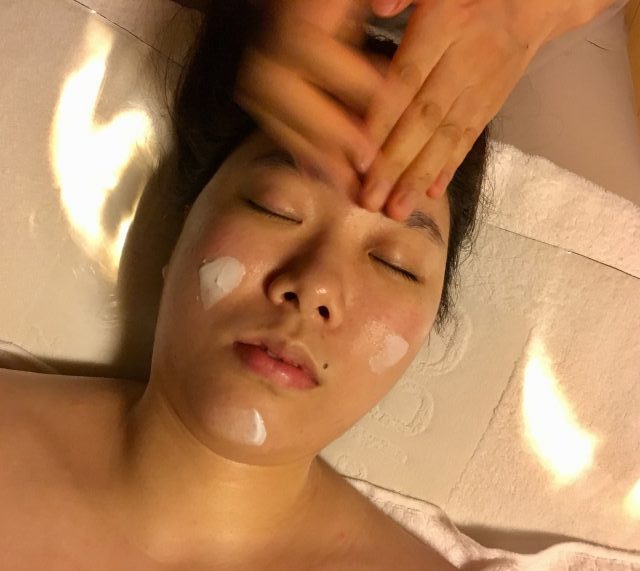 Application of ampoules during a facial in Seoul.