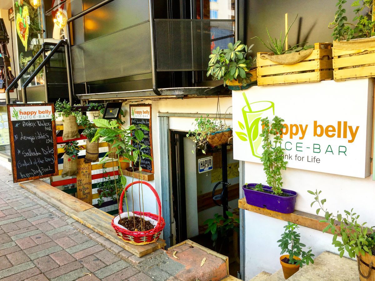 storefront of happy belly juice bar in tirana