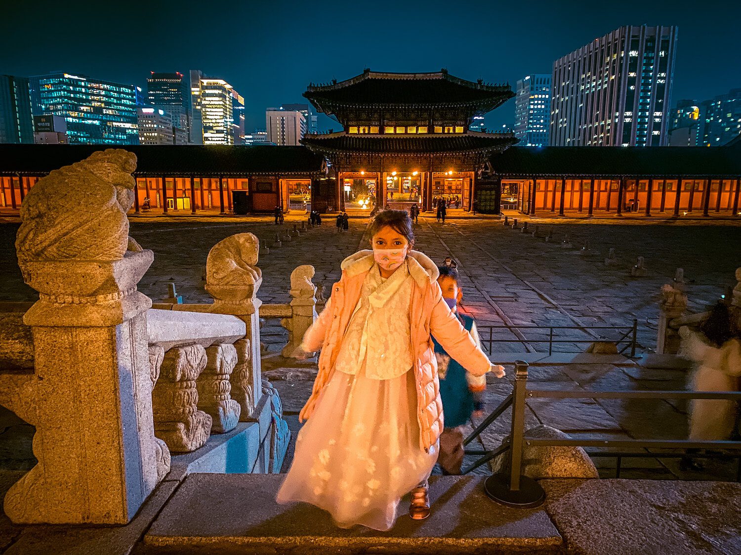 girl in korean hanbok in seoul at gyeongbokgung palace