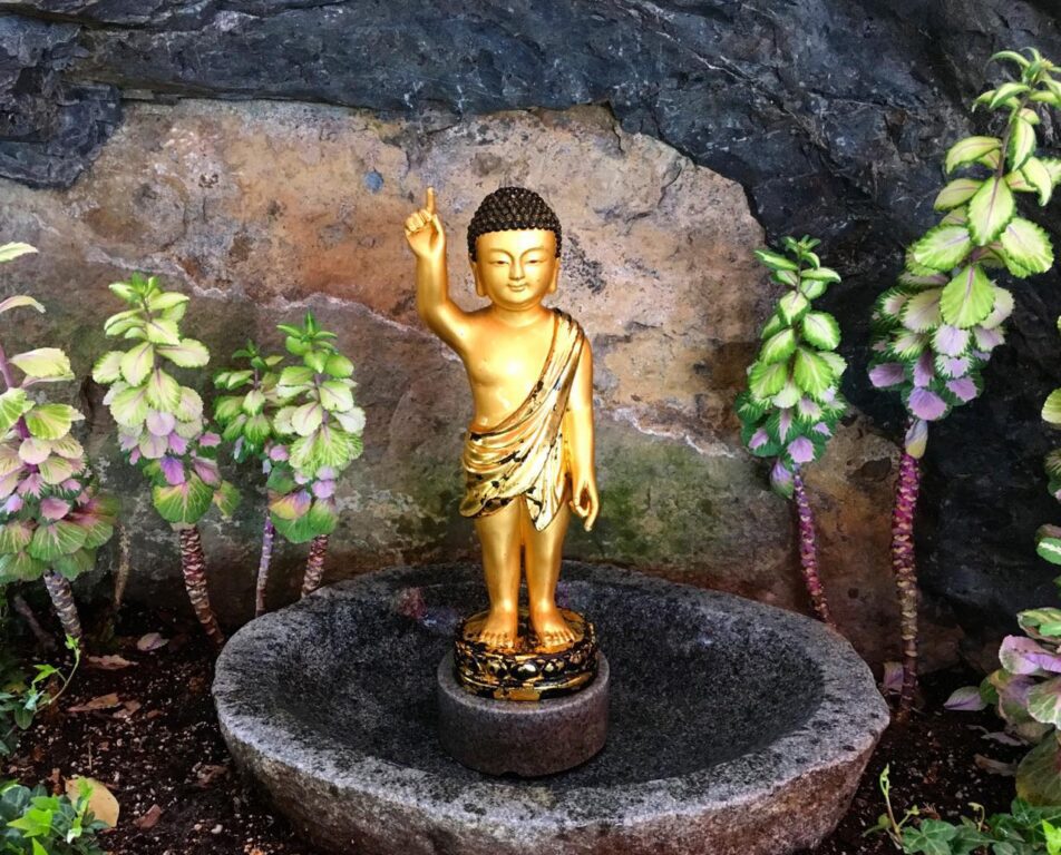 gold monk statue at hyangiram hermitage in yeosu