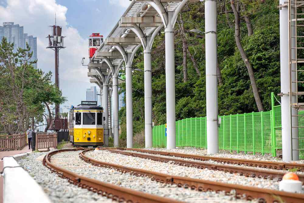 haeundae beach train at blueline park in busan